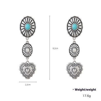 Pair of silver earrings with turquoise stones and heart designs, shown with measurements on a white background.